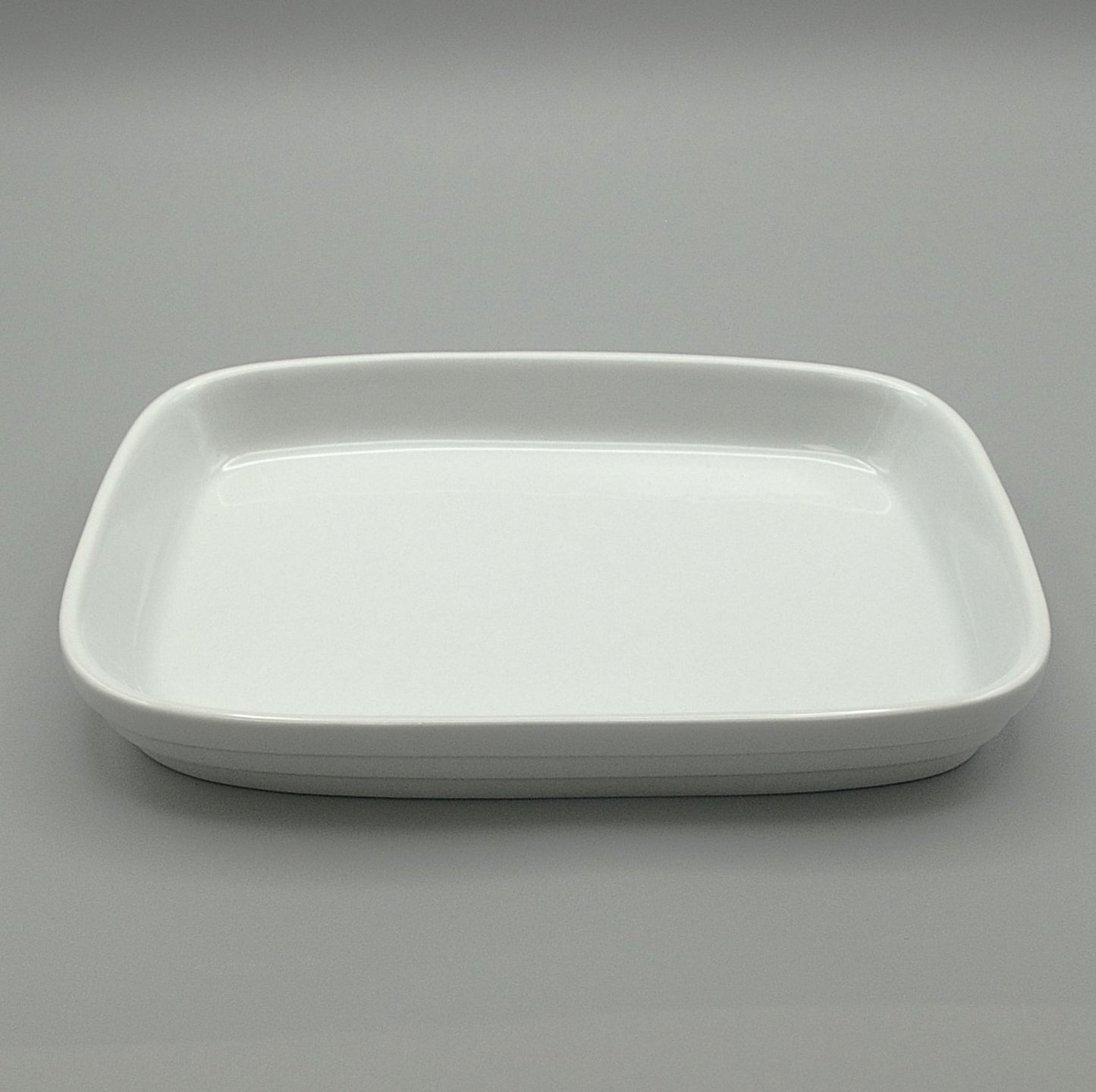 RPCW-75/55 - Porcelain 7.5'' x 5.5'' Rectangular Flat Bottom White Rethrema Plate