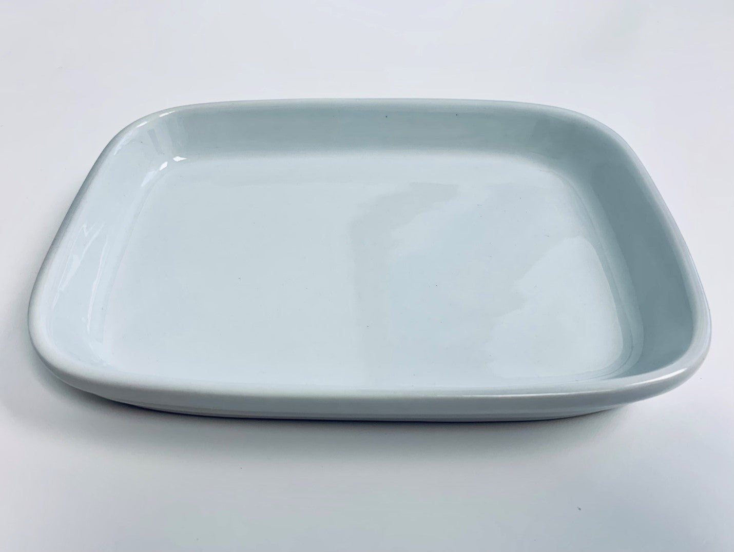 RPCW-75/55 - Porcelain 7.5'' x 5.5'' Rectangular Flat Bottom White Rethrema Plate